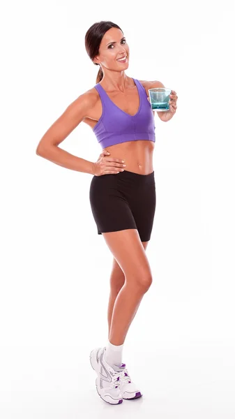 Fitness lady with glass of water Stock Image