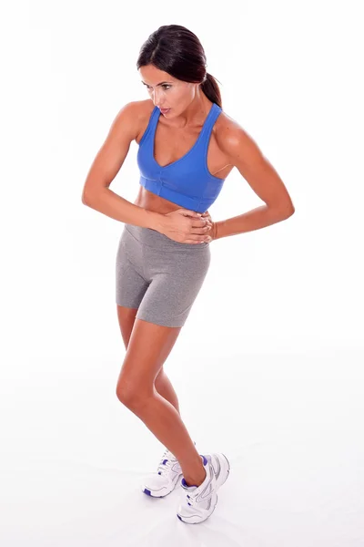 Brunette woman with hands on hip — Stock Photo, Image