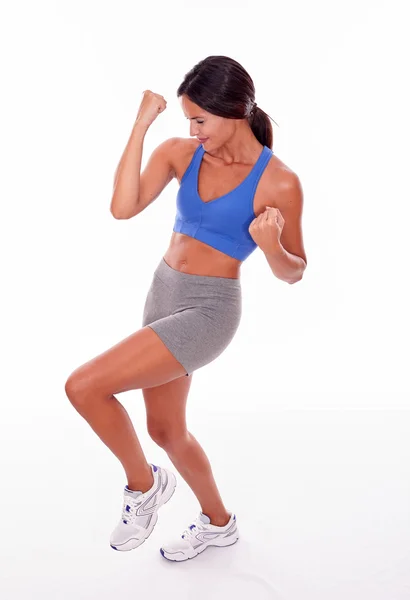 Celebrating fitness adult woman Stock Photo