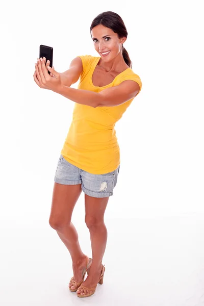 Young woman with cell phone — Stock Photo, Image