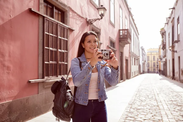Young woman tourist with camera Stock Photo