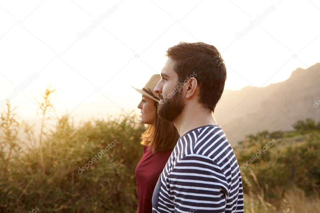 young couple looking at something