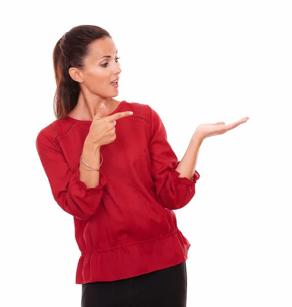 Young hispanic lady holding her left hand up — Stock Photo, Image