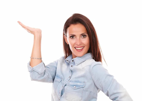 Pretty young woman holding her right palm up — Stock Photo, Image