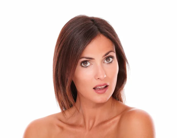 Surprised young woman with nude shoulders — Stock Photo, Image