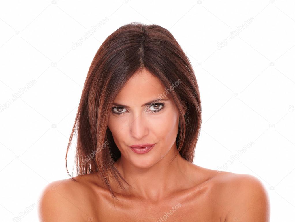 Young seductive latin woman looking at camera