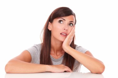 Reflective woman wondering while looking up clipart