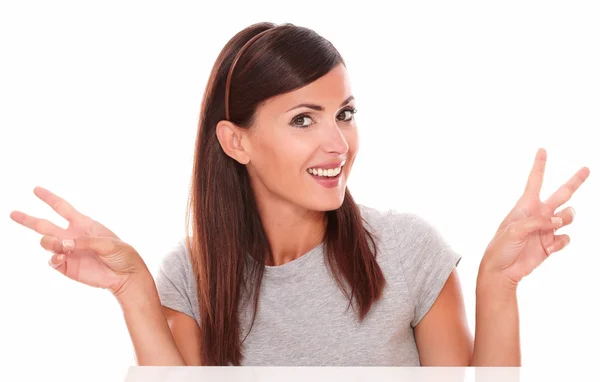 Happy latin woman with victory fingers — Stock Photo, Image