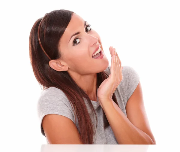 Charming brunette with surprised gesture smiling — Stock Photo, Image