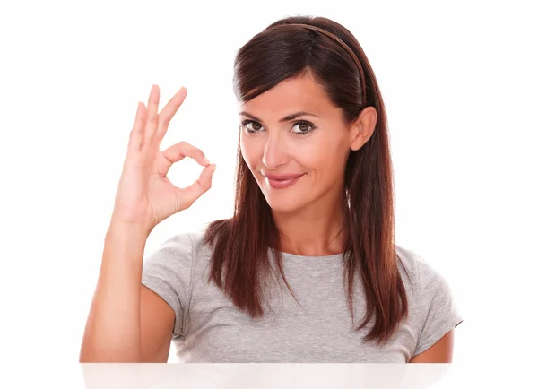 Positive happy brunette with ok sign — Stock Photo, Image