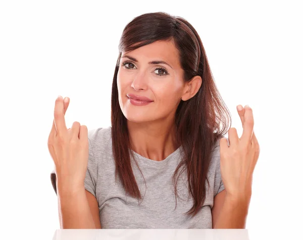 Lovely lady making a wish with luck sign — Stock Photo, Image