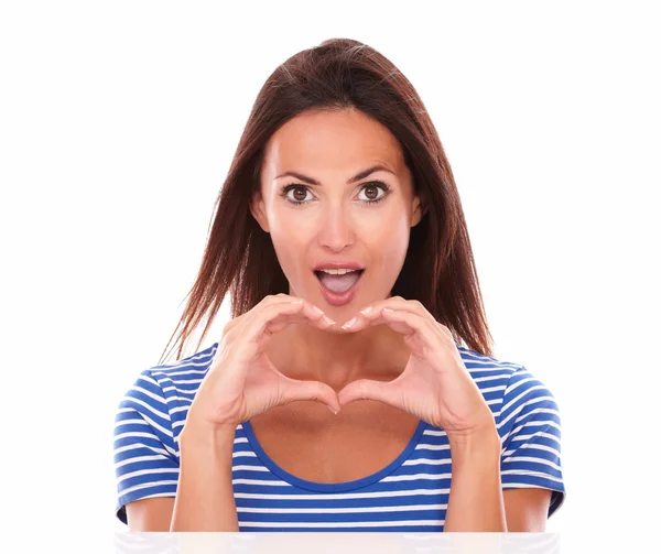 Pretty young woman with heart sign — Stock Photo, Image