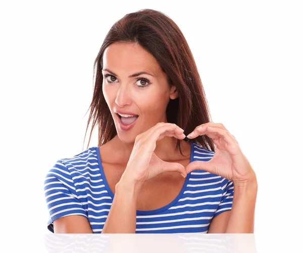 Lovely young female with heart sign — Stock Photo, Image