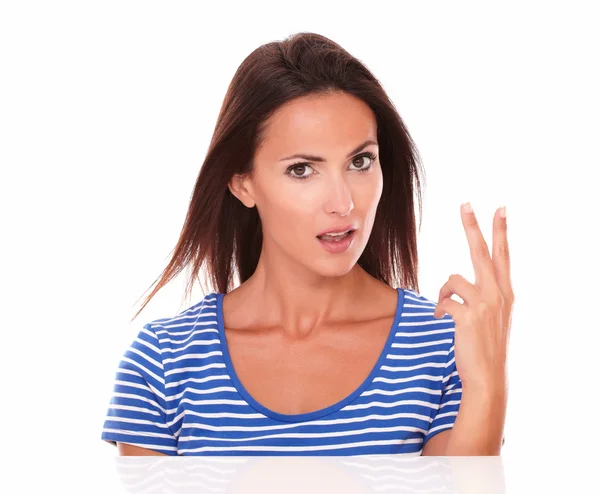 Beautiful female gesturing a victory sign — Stock Photo, Image
