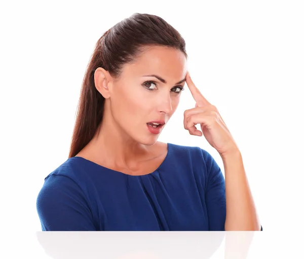 Young woman in blue blouse looking at you — Stock Photo, Image