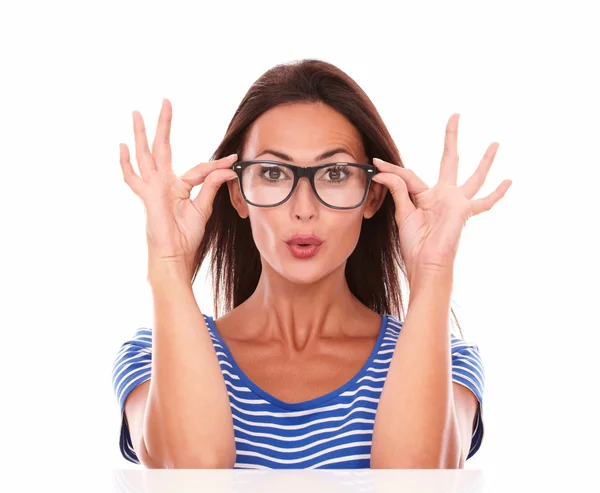 Happy female holding glasses while smiling — Stock Photo, Image