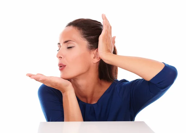 Pretty brunette with closed eyes blowing a wish — Stock Photo, Image