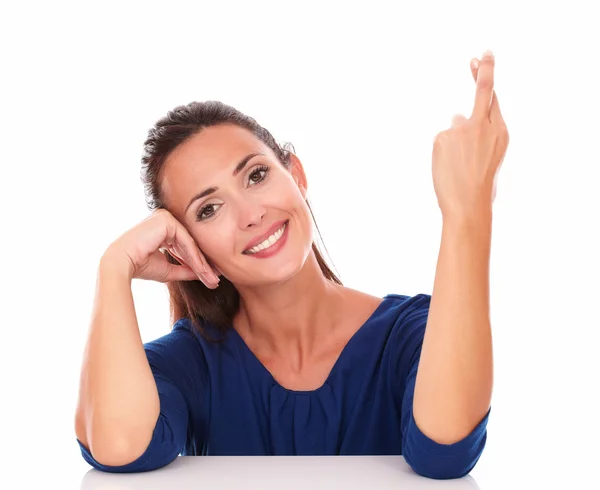 Cute lady smiling and crossing fingers — Stock Photo, Image