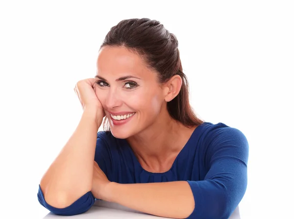 Young girl in blue blouse looking at you — Stock Photo, Image