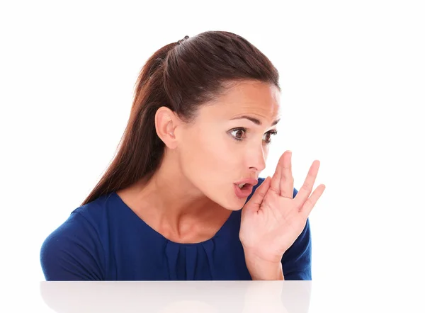 Charming young lady whispering a secret — Stock Photo, Image