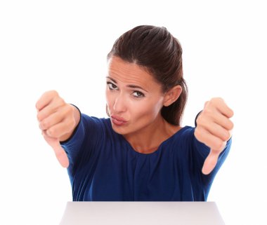 Attractive lady in blue shirt with thumb down clipart