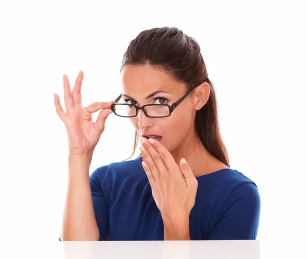 Shy girl looking embarrassed with hand on mouth — Stock Photo, Image