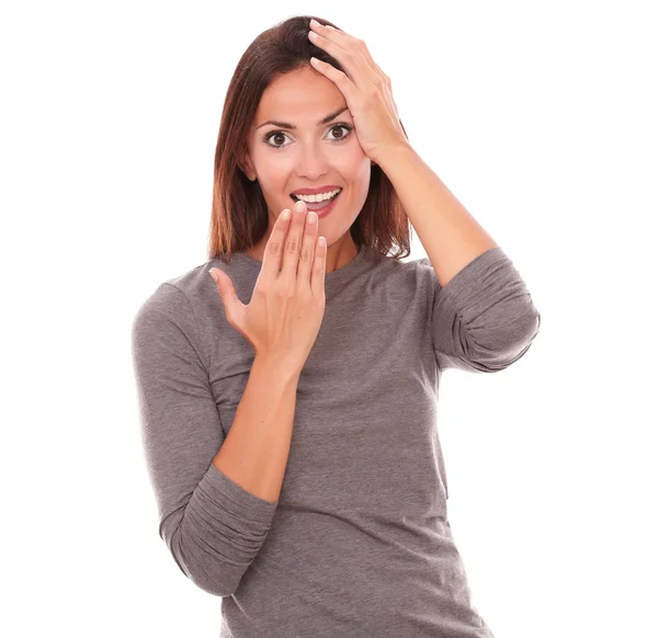 Surprised girl holding mouth and looking at you — Stock Photo, Image