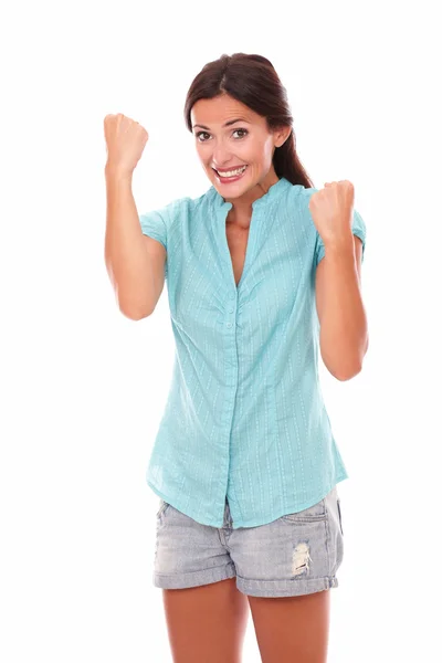 Happy lady in blue shirt with arms up — Stock Photo, Image