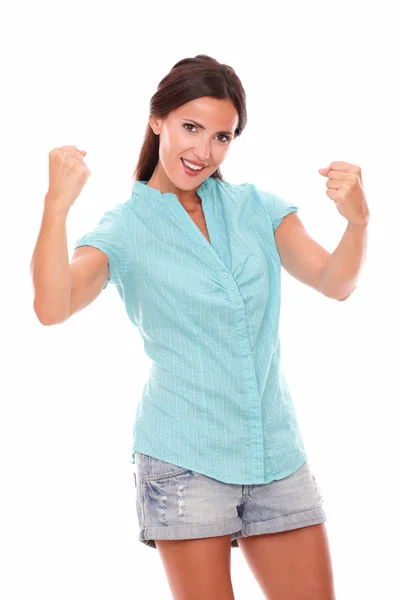 Pretty hispanic lady in blue shirt with arms up — Stock Photo, Image