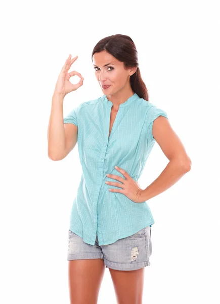 Cheerful girl gesturing a great job — Stock Photo, Image