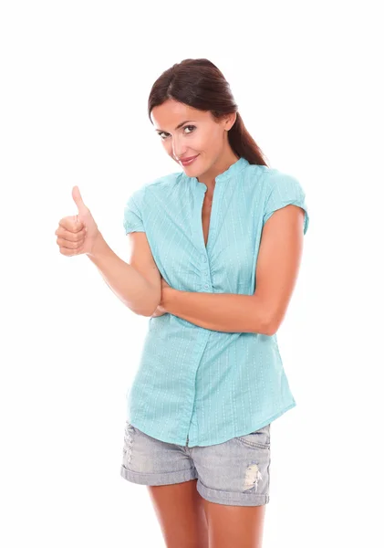 Cheerful woman looking at you with thumb up — Stock Photo, Image