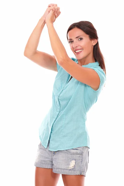 Lovely girl in blue shirt with arms up — Stock Photo, Image