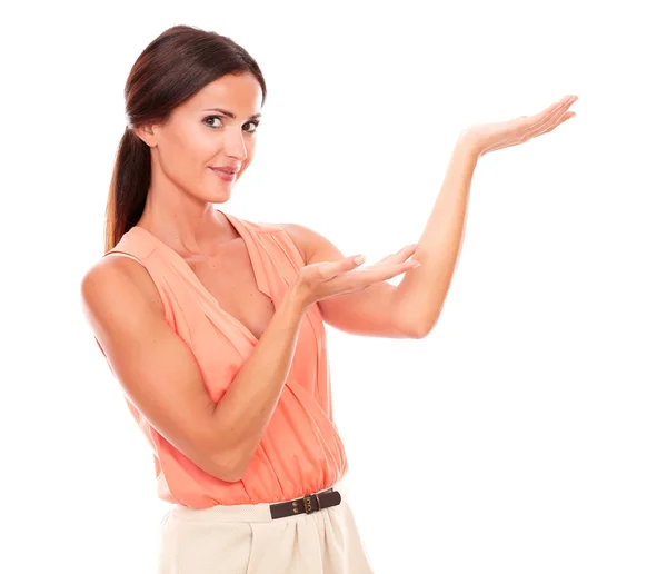 Friendly hispanic woman holding palms up — Stock Photo, Image