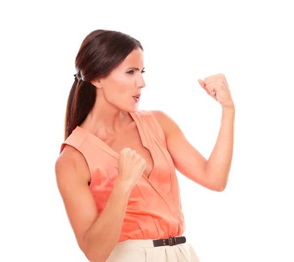 Attractive young female making a winning sign — Stock Photo, Image