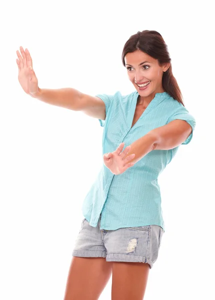 Lovely young lady gesturing a greeting — Stock Photo, Image