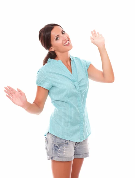 Lovely hispanic woman gesturing a greeting — Stock Photo, Image