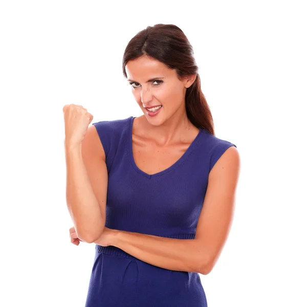 Happy woman in purple dress with arm up — Stock Photo, Image