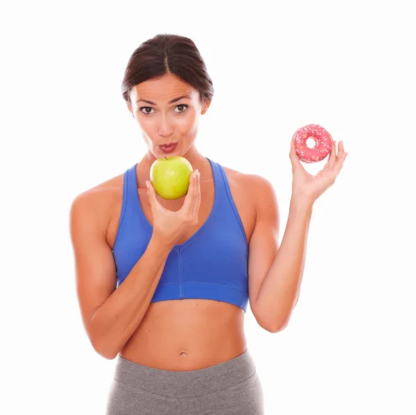 Fit young woman holding tempting food — Stockfoto