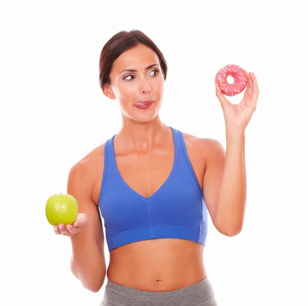 Brunette woman in sport clothing dieting — Stock Photo, Image