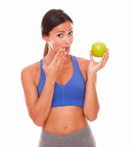 Slim adult female holding apple on left hand — Stock Photo, Image