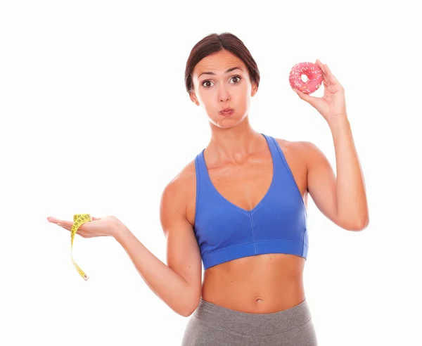 Slim lady wybór między cukru i fitness — Zdjęcie stockowe