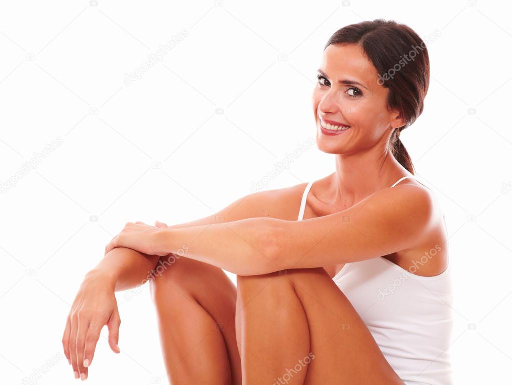 Pretty lady with healthy skin sitting