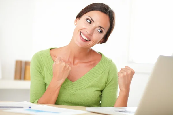 Excited female winner browsing the web — Stock Photo, Image