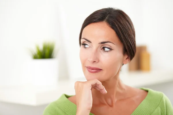 Beautiful woman looking away at indoors — Stock Photo, Image