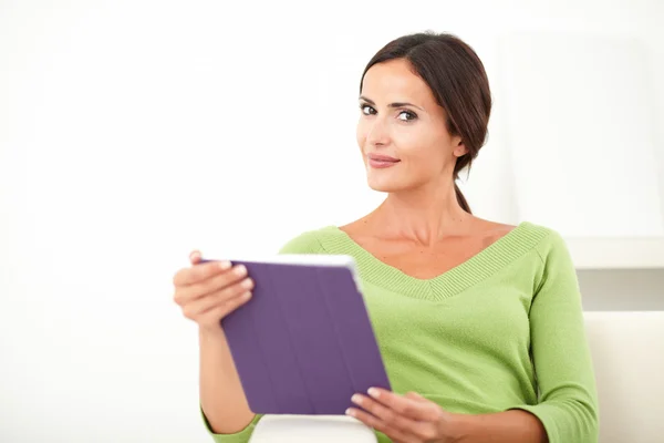 Beautiful young woman with tablet — Stock Photo, Image