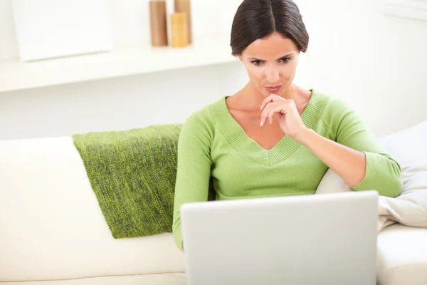 Concentrated person using a laptop — Stock Photo, Image