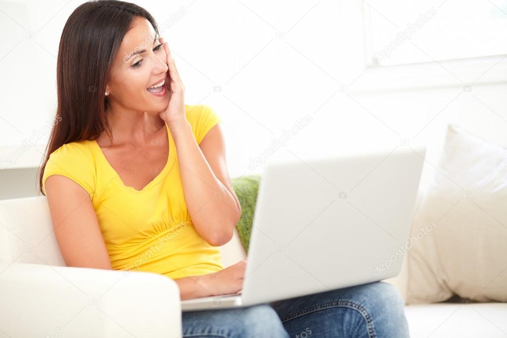 woman browsing on her laptop