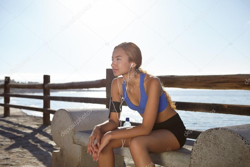 athlete sitting outside