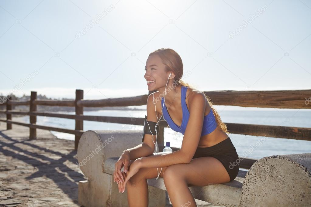 female jogger resting