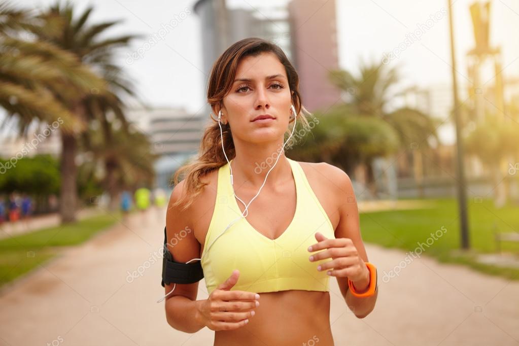 young woman running outdoors